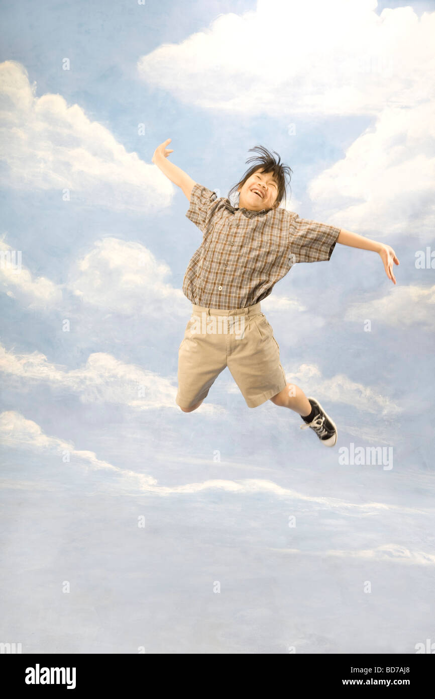Girl jumping in air Stock Photo