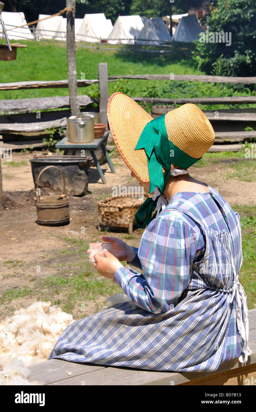 Girl making wool yarn Stock Photo