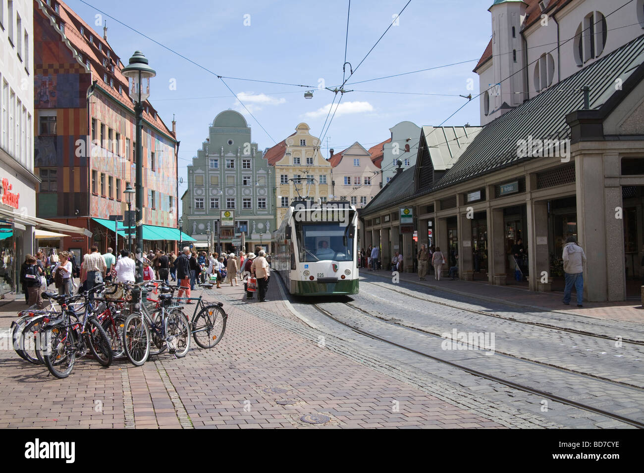 Augsburg Bavaria Germany EU Looking along the very busy Moritzplatz with a tram and parked bicycles Stock Photo