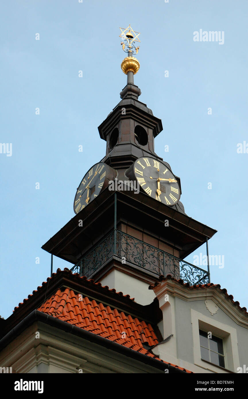 Clock tower with Roman numeral markings of the Jewish town Hall located in Josefov, Jewish Quarter in Prague Czech Stock Photo