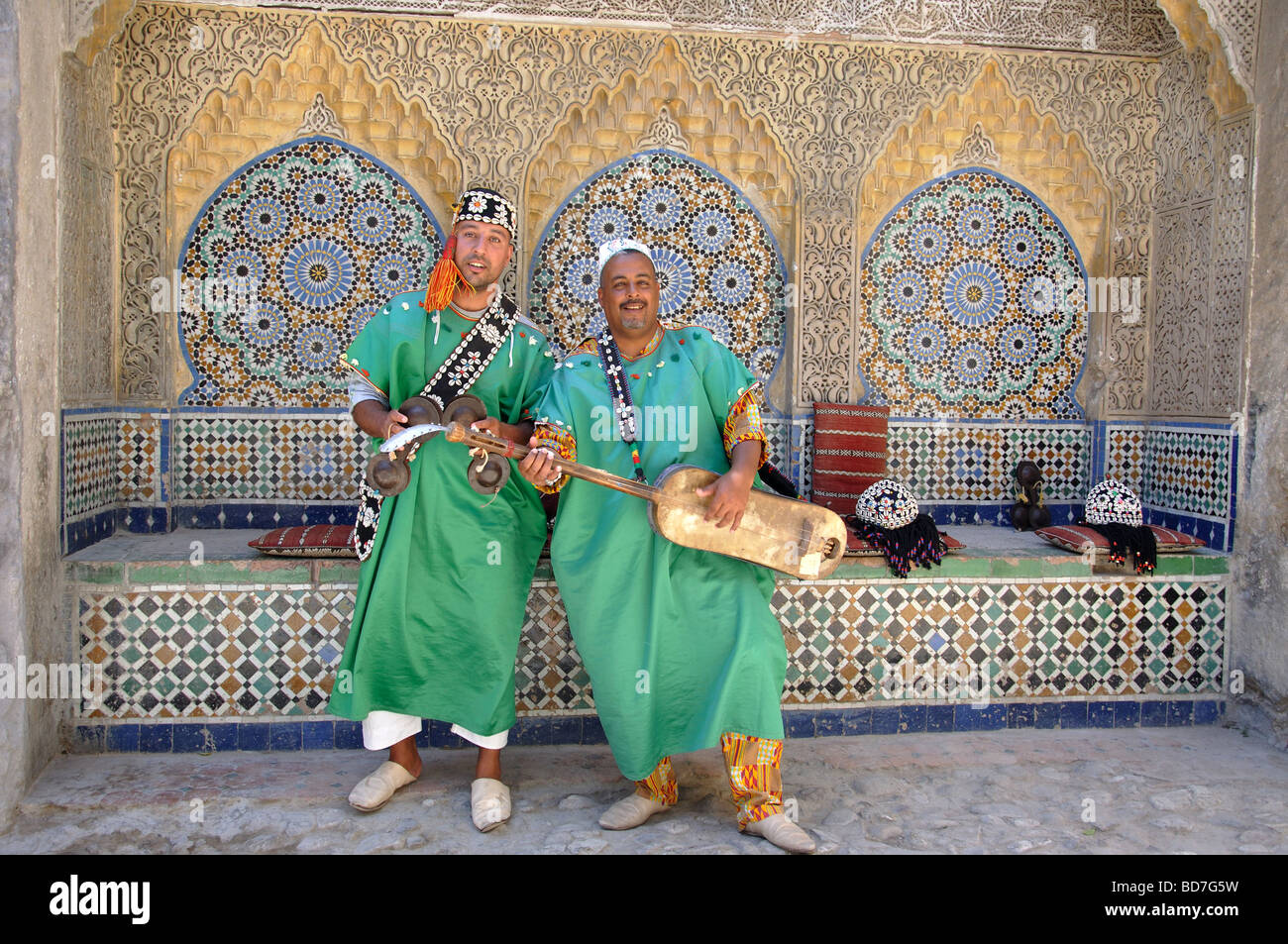 Moroccan Gnawa musicians with guembri, Medina, Tangier, Tangier-Tétouan Region, Kingdom of Morocco Stock Photo