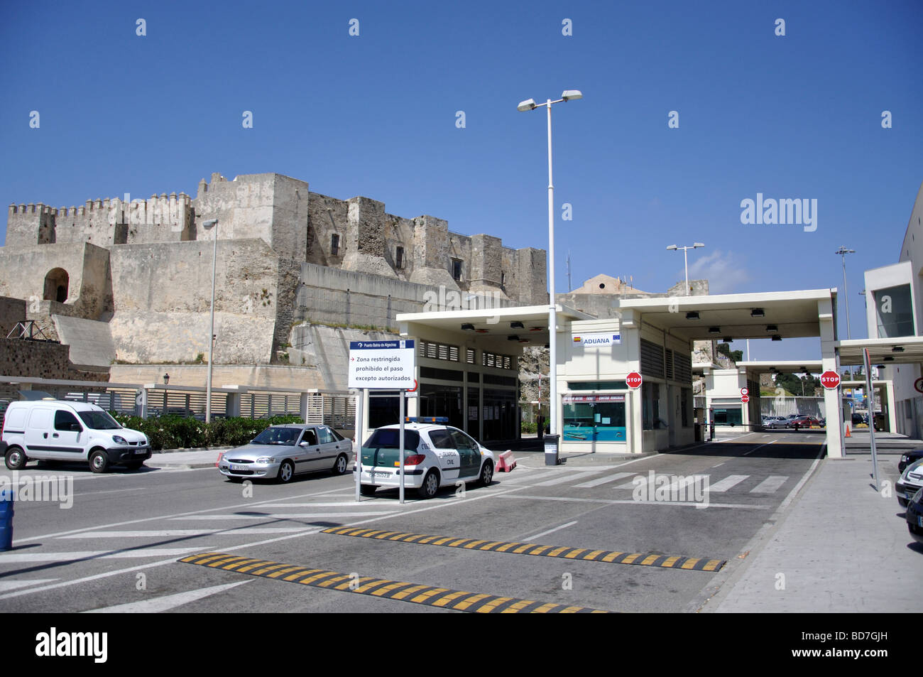 Tarifa Castle and border control at Port, Tarifa, Cadiz Province, Andalusia, Spain Stock Photo