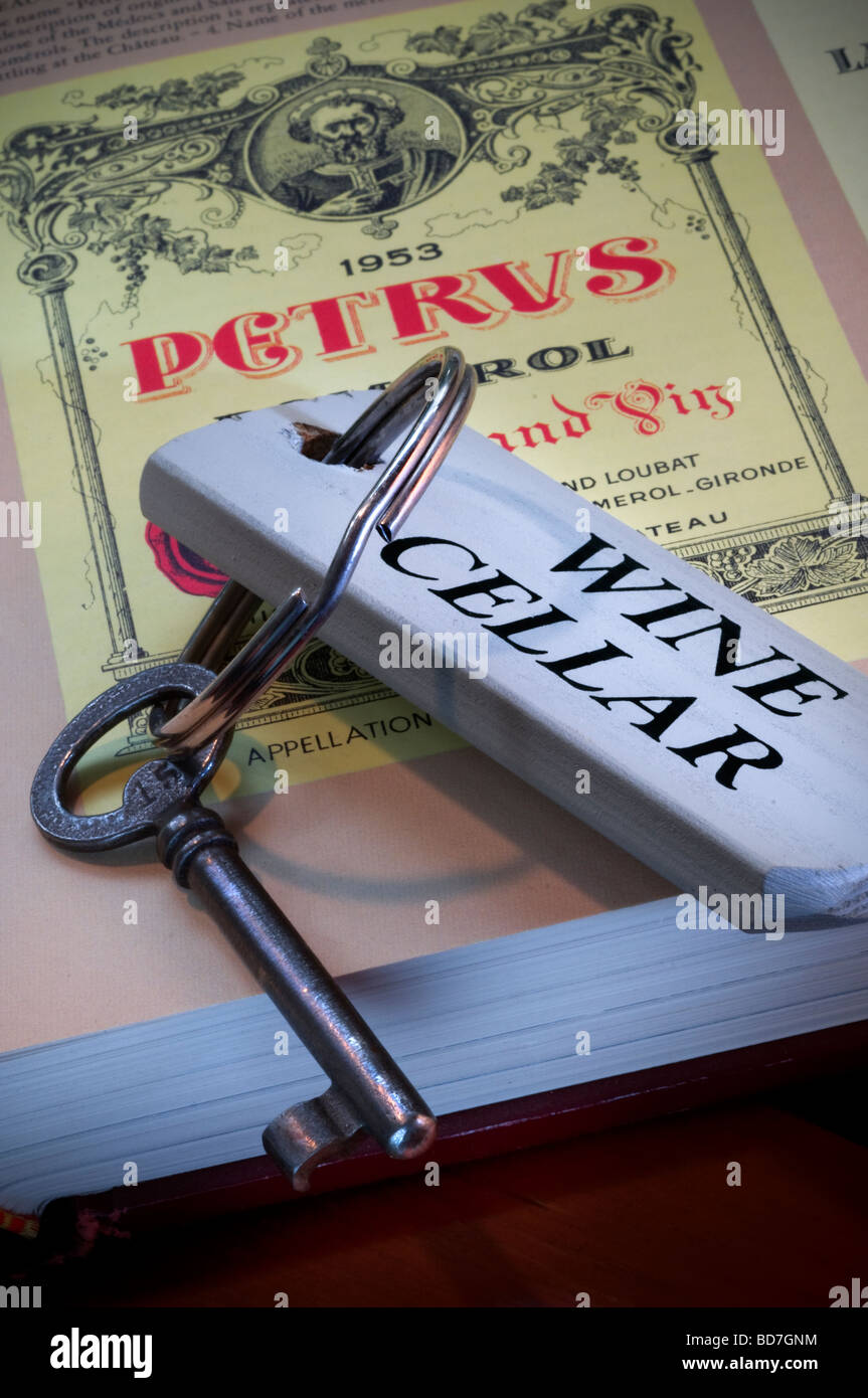 Key to wine cellar on wine reference book showing illustration of