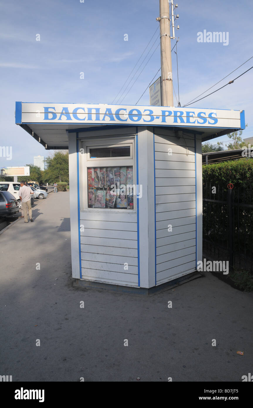 Street scene in Atyrau Kazakhstan showing press and notice board
