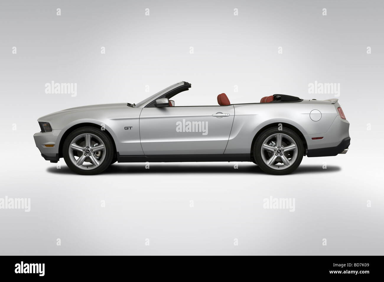 2010 Ford Mustang GT in Silver - Drivers Side Profile Stock Photo