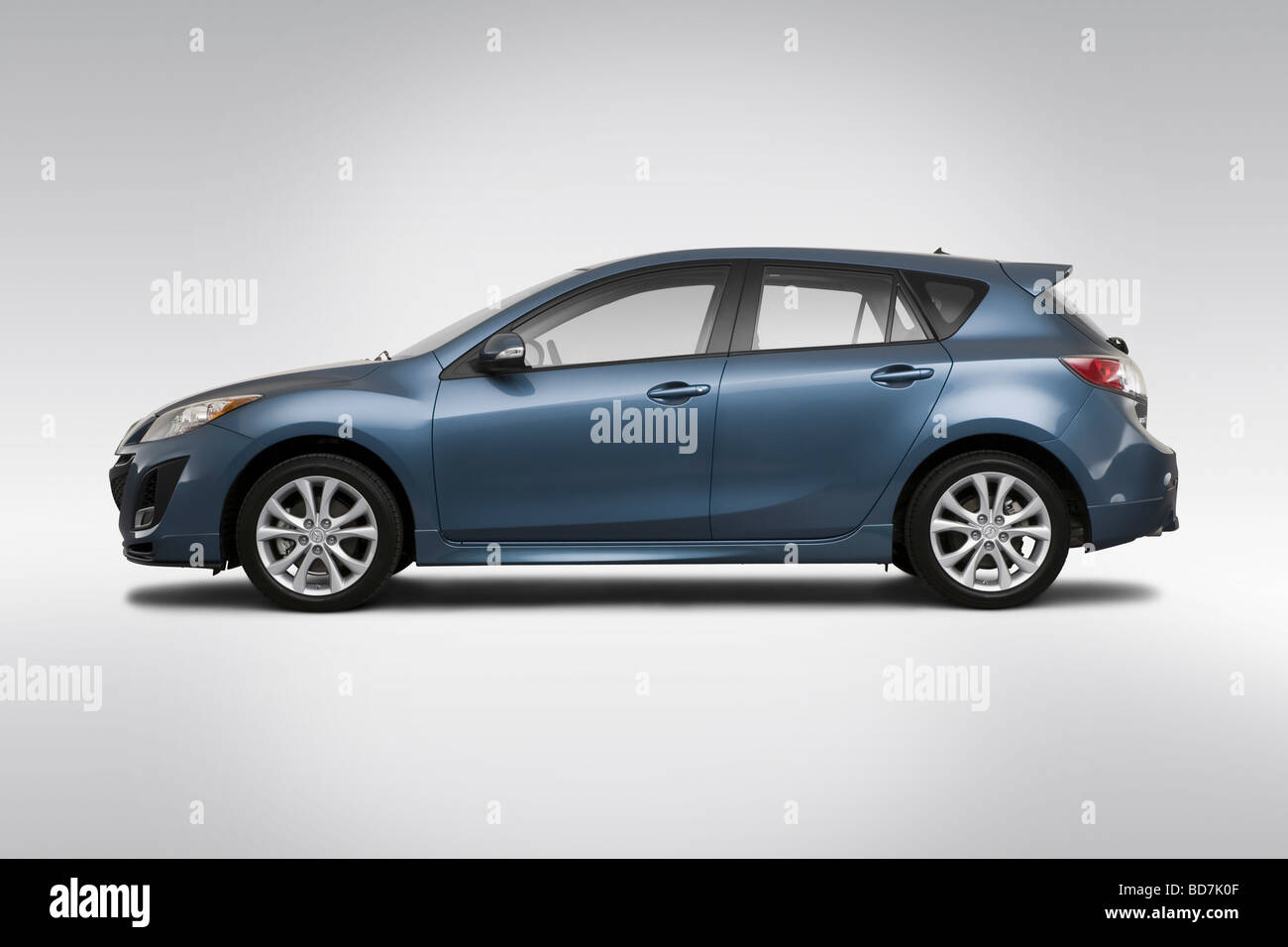 2010 Mazda MAZDA3 s in Blue - Drivers Side Profile Stock Photo - Alamy