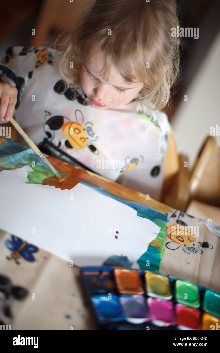 girl painting with watercolors Stock Photo - Alamy