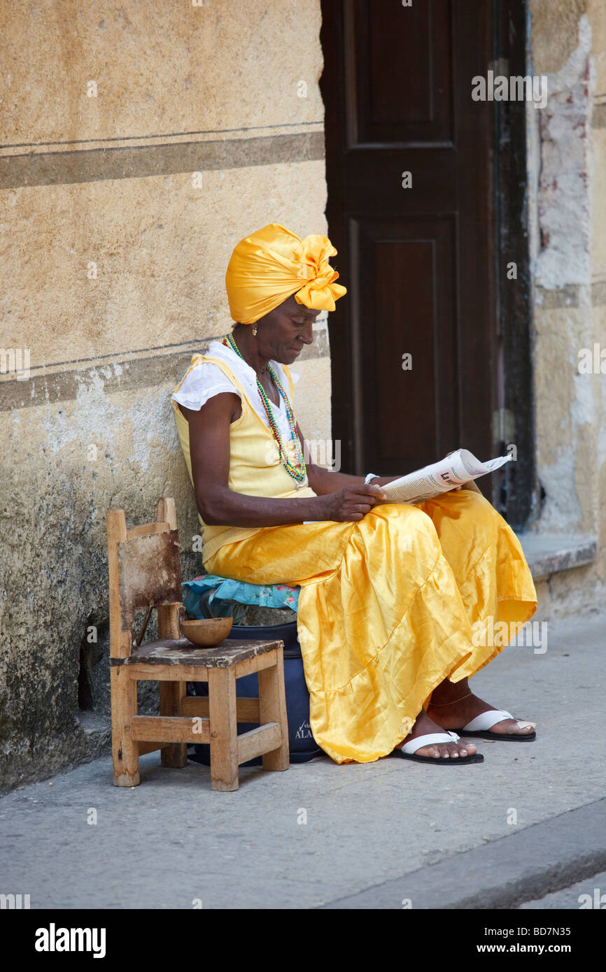 cuban woman sitting on street Stock Photo