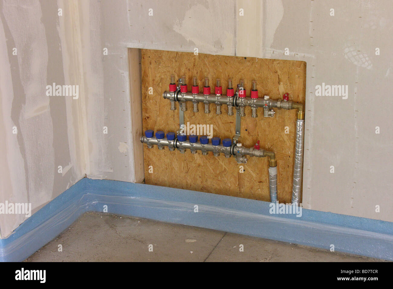 distribution board for underfloor heating Stock Photo - Alamy