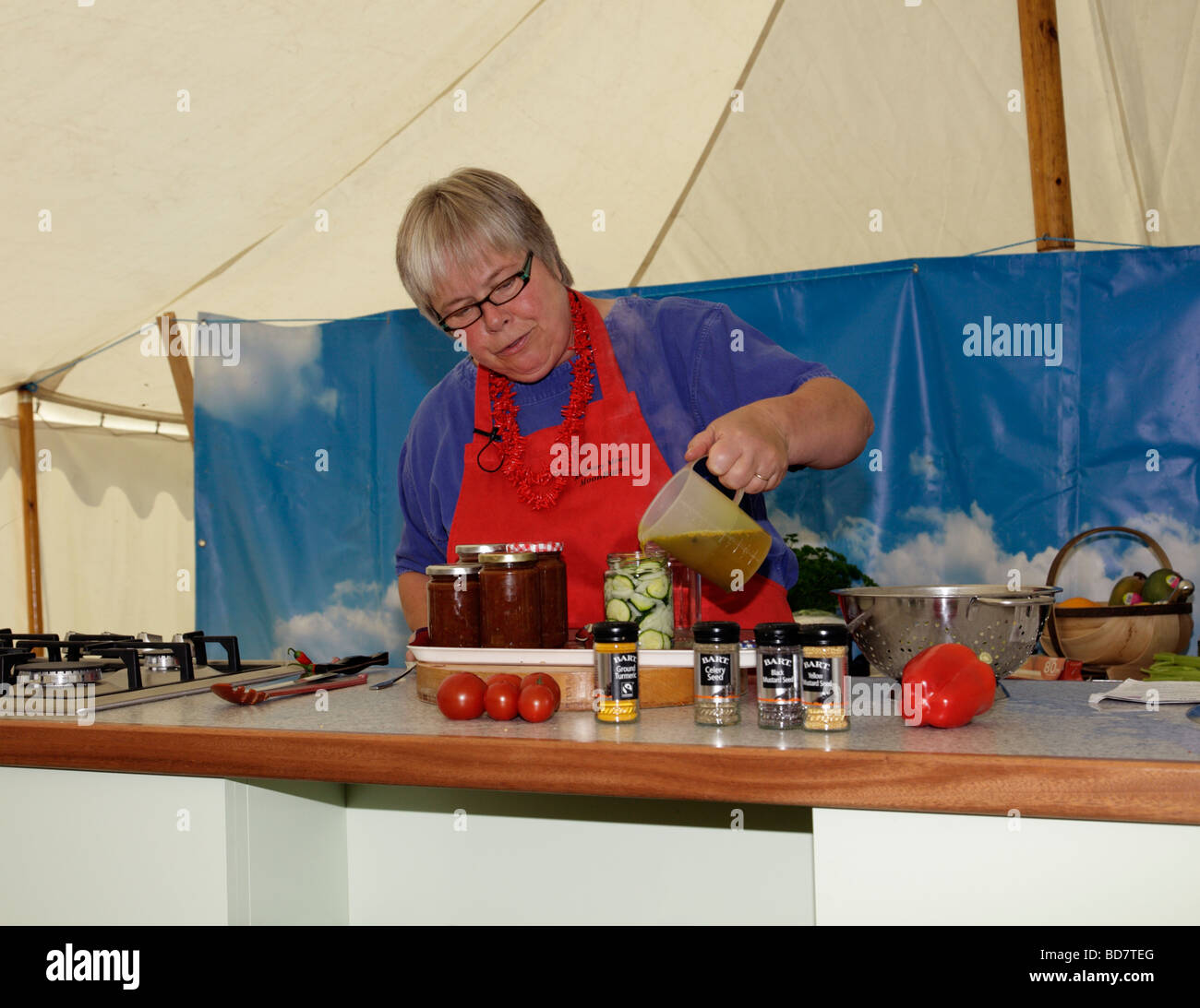 A pickling demonstration by Rosemary Moon at the Chilli Fiesta, West Dean Gardens, West Sussex, England, UK. Stock Photo