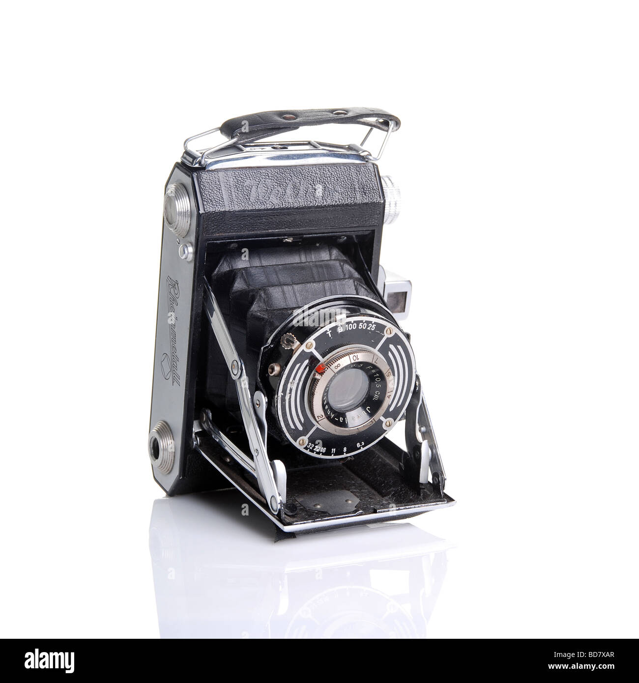 Vintage photo camera isolated on white background Stock Photo - Alamy