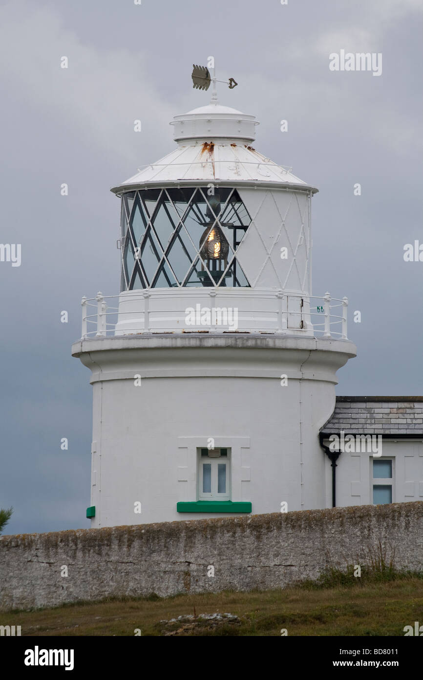 The lamp and tower of Anvil Point Lighthouse near Swanage, Dorset, UK Stock Photo