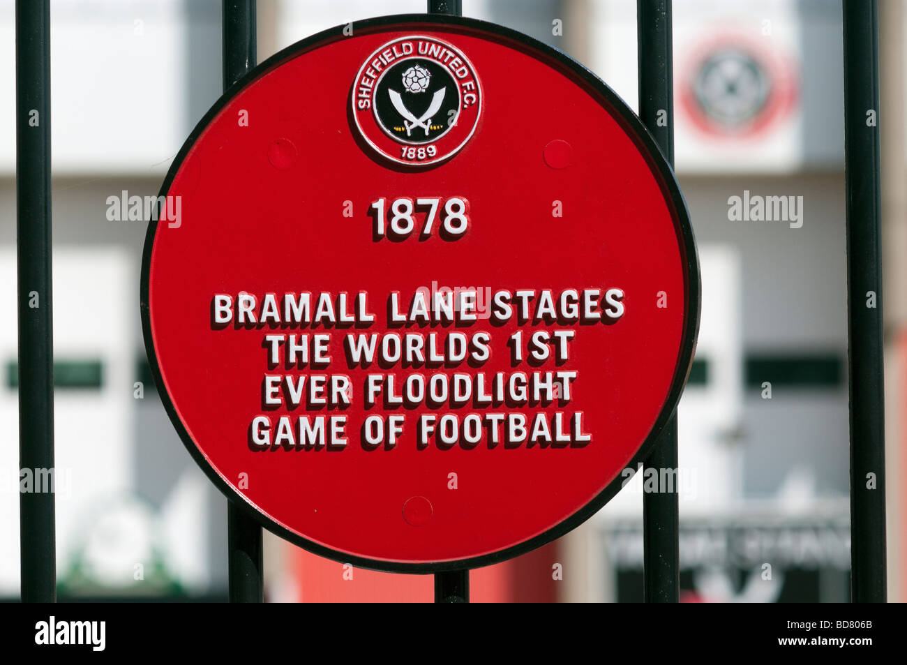 Red circular commemorative plaque 'Bramall Lane' stages the worlds 1st Floodlit game of football Stock Photo