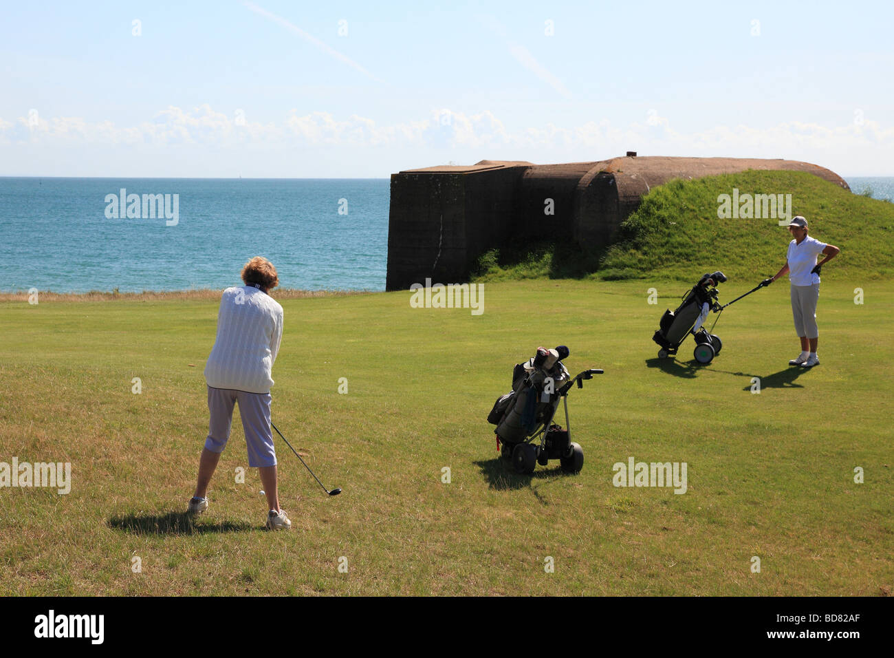 Two women golfers in Royal Jersey Golf Club in Grouville, Jersey Channel Islands Stock Photo