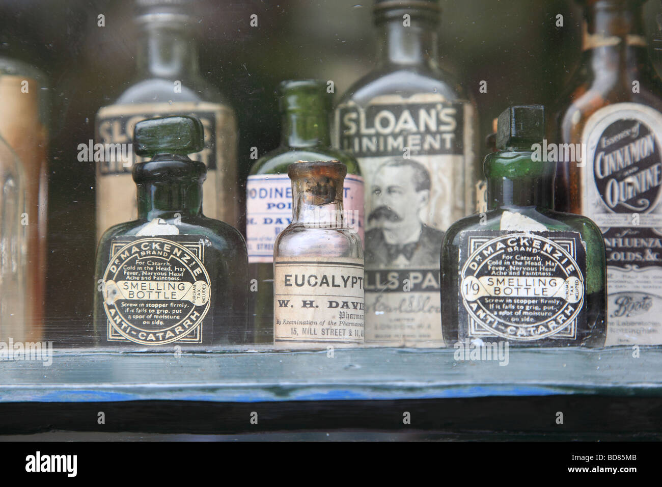 Bottles with old medicine in victorian Shop St. Peter Port Guernsey Channel Islands Stock Photo