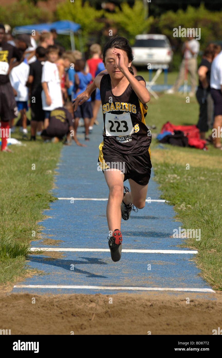 Male long jump competitor in the Track and Field event during the