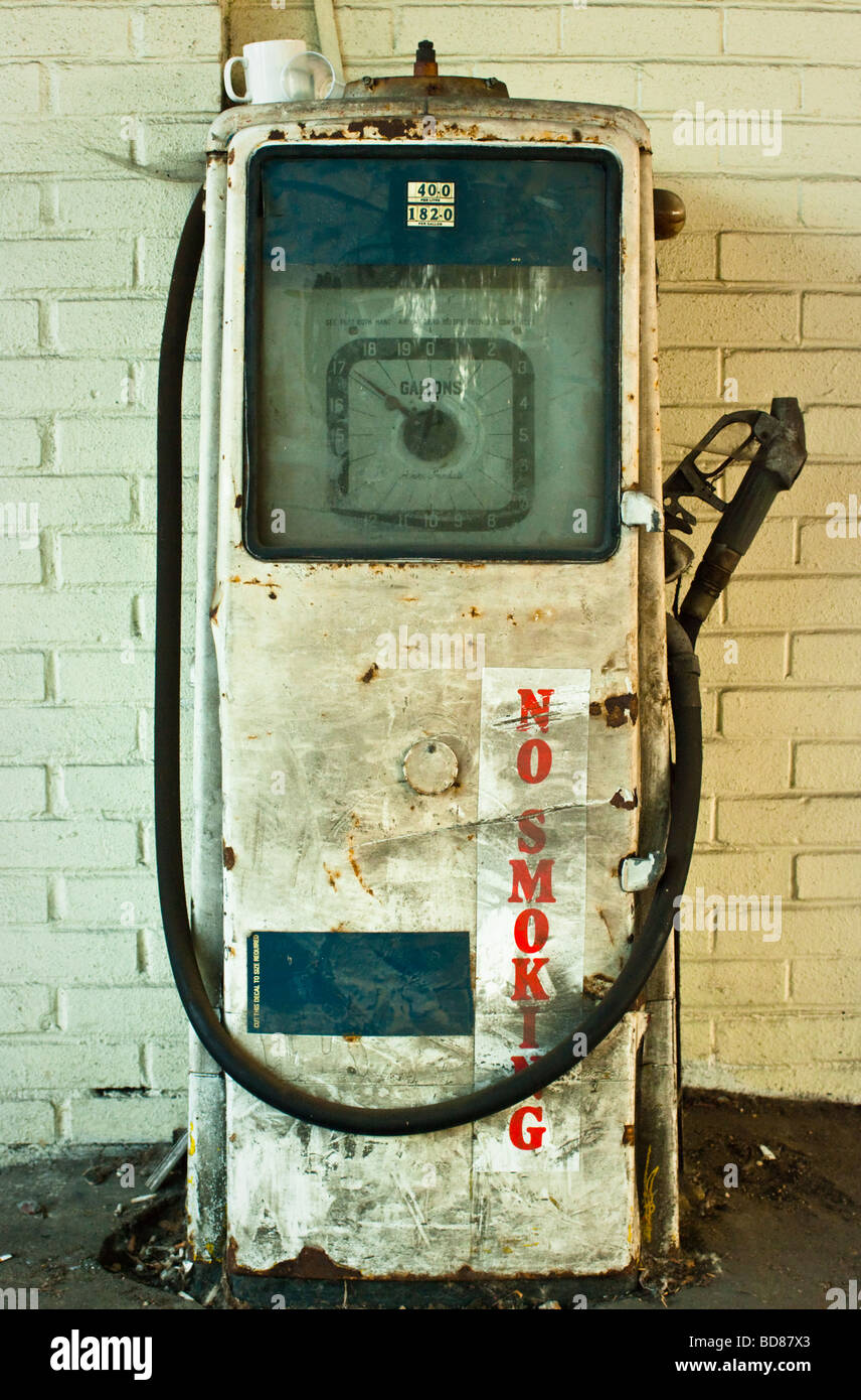 Old petrol pump in disused filling station, Berkshire, UK Stock Photo