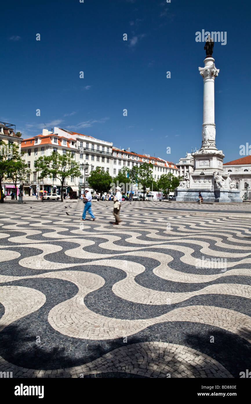 Tourists in Rossio Square Baixa district Lisbon Portugal Europe Stock Photo