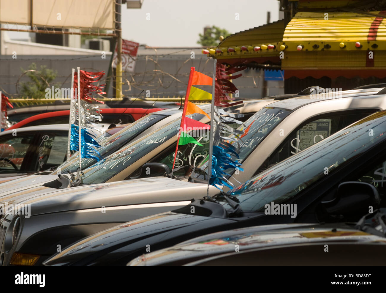 Used and pre owned automobiles are offered for sale at car dealers on Northern Boulevard in the borough of Queens in New York Stock Photo