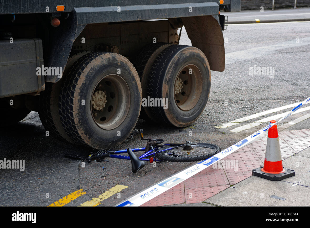 Bicycle under the wheels of a lorry after accident Stock Photo Alamy