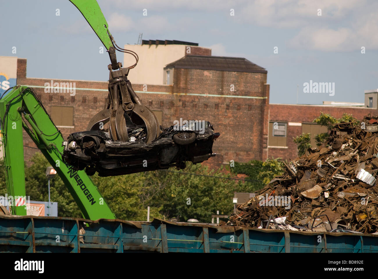 Automobiles at a scrap metal recycler on Newtown Creek separating