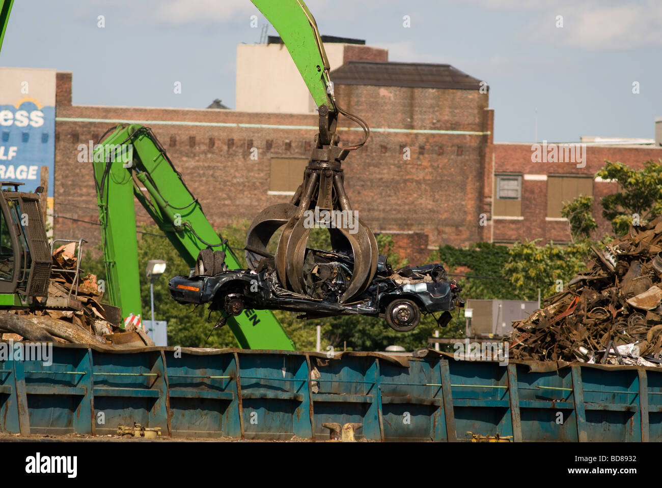 Automobiles at a scrap metal recycler on Newtown Creek separating