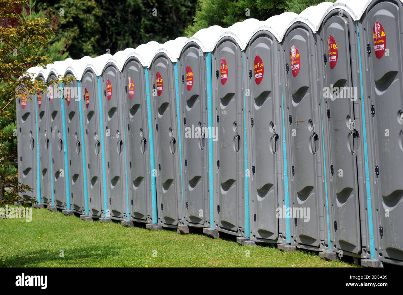 A row of Portable toilets in brighton's preston park Stock Photo Alamy