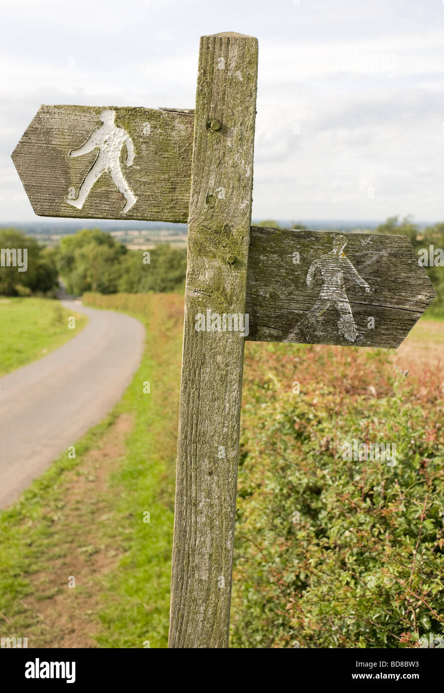 A signpost for walkers on the Cotswold Way footpath in Gloucestershire England UK Stock Photo