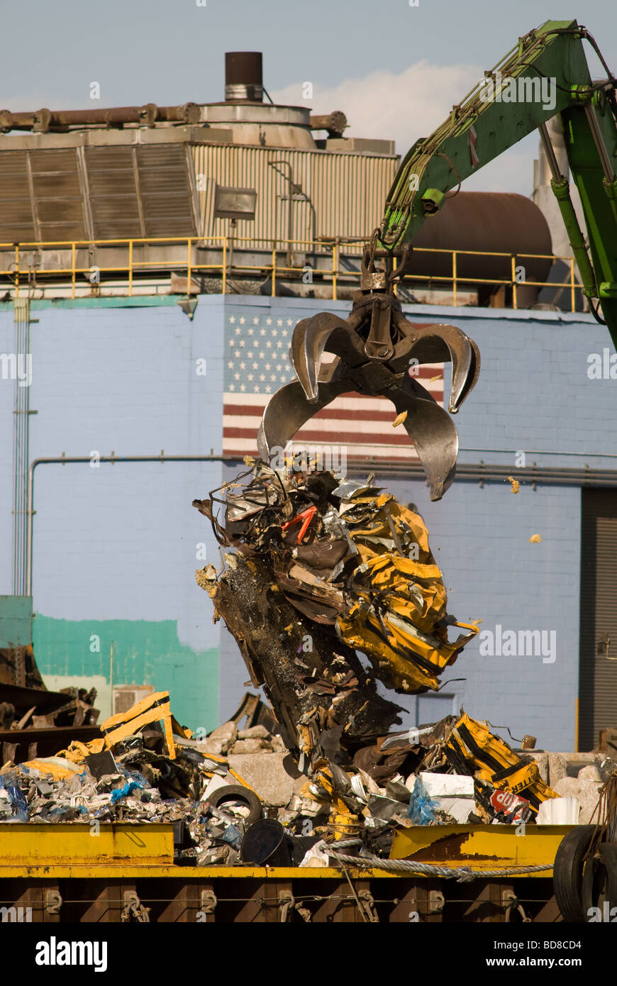 Automobiles at a scrap metal recycler on Newtown Creek separating