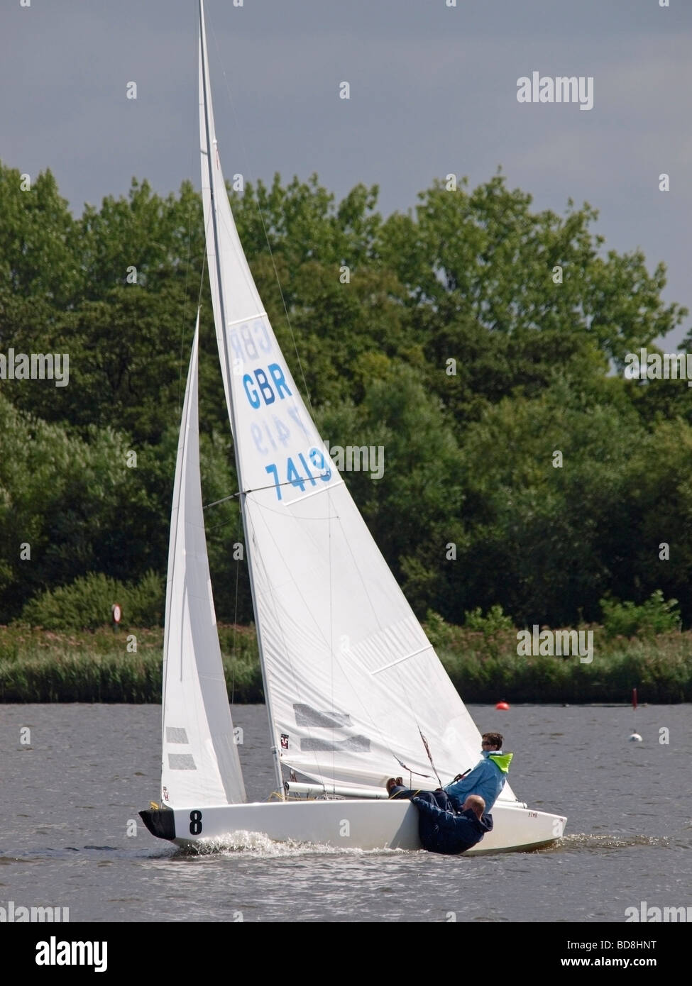 INTERNATIONAL STAR CLASS BOAT SAILING ON WROXHAM BROAD DURING REGATTA