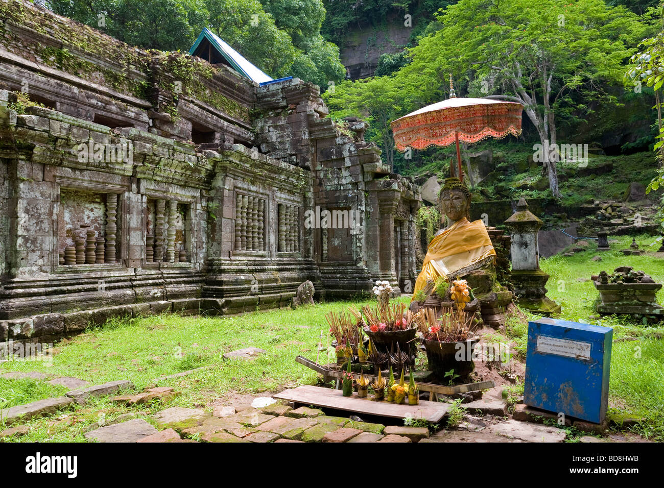 A working Buddhist shrine at the top of the Champasak temple complex Laos Stock Photo