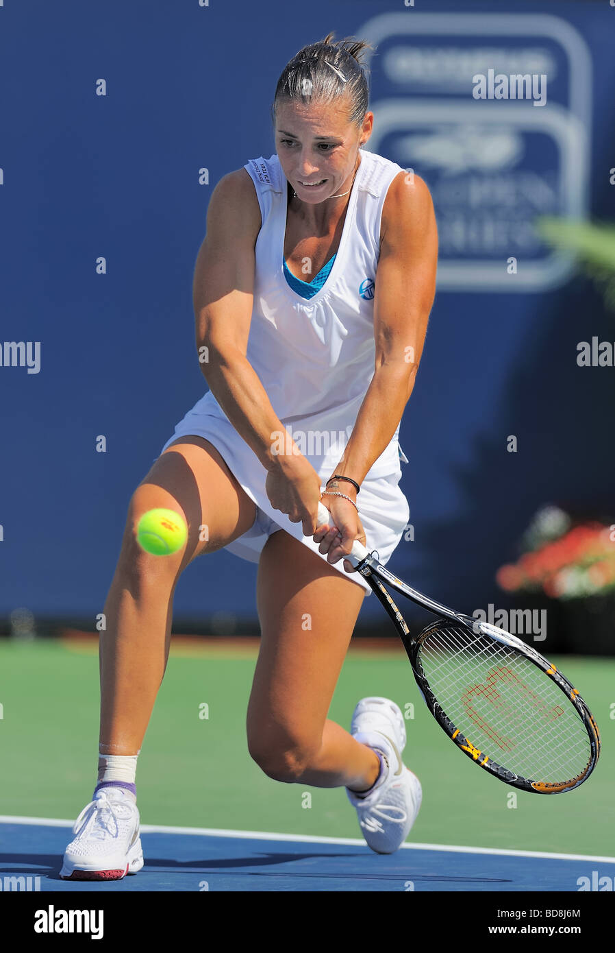 Flavia Pennetta of Italy hits a winner during the tournament final, becoming the '09 Los Angeles Championship's WTA champion. Stock Photo