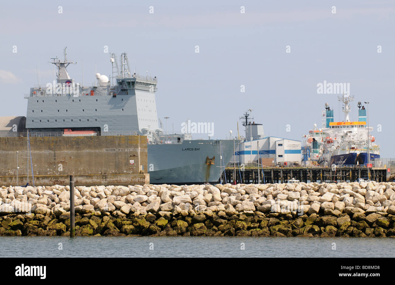 Portland Harbour alongside RFA Largs Bay a Royal Fleet Auxiliary ship and Global Marine premises with CS Sovereign Stock Photo