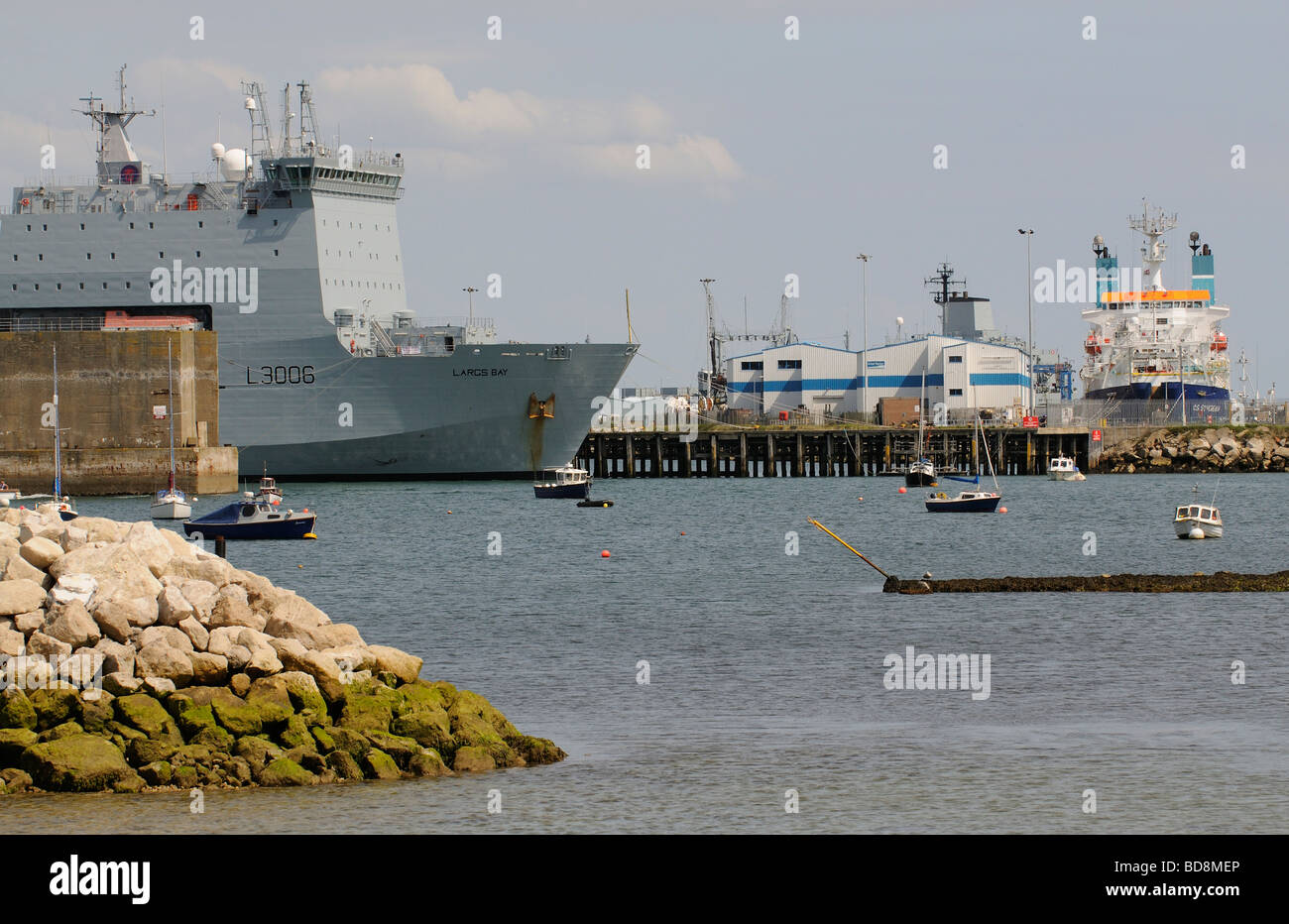 Global Marine Systems Portland Harbour base alongside is GS Sovereign a multi roll DP2 ship Stock Photo