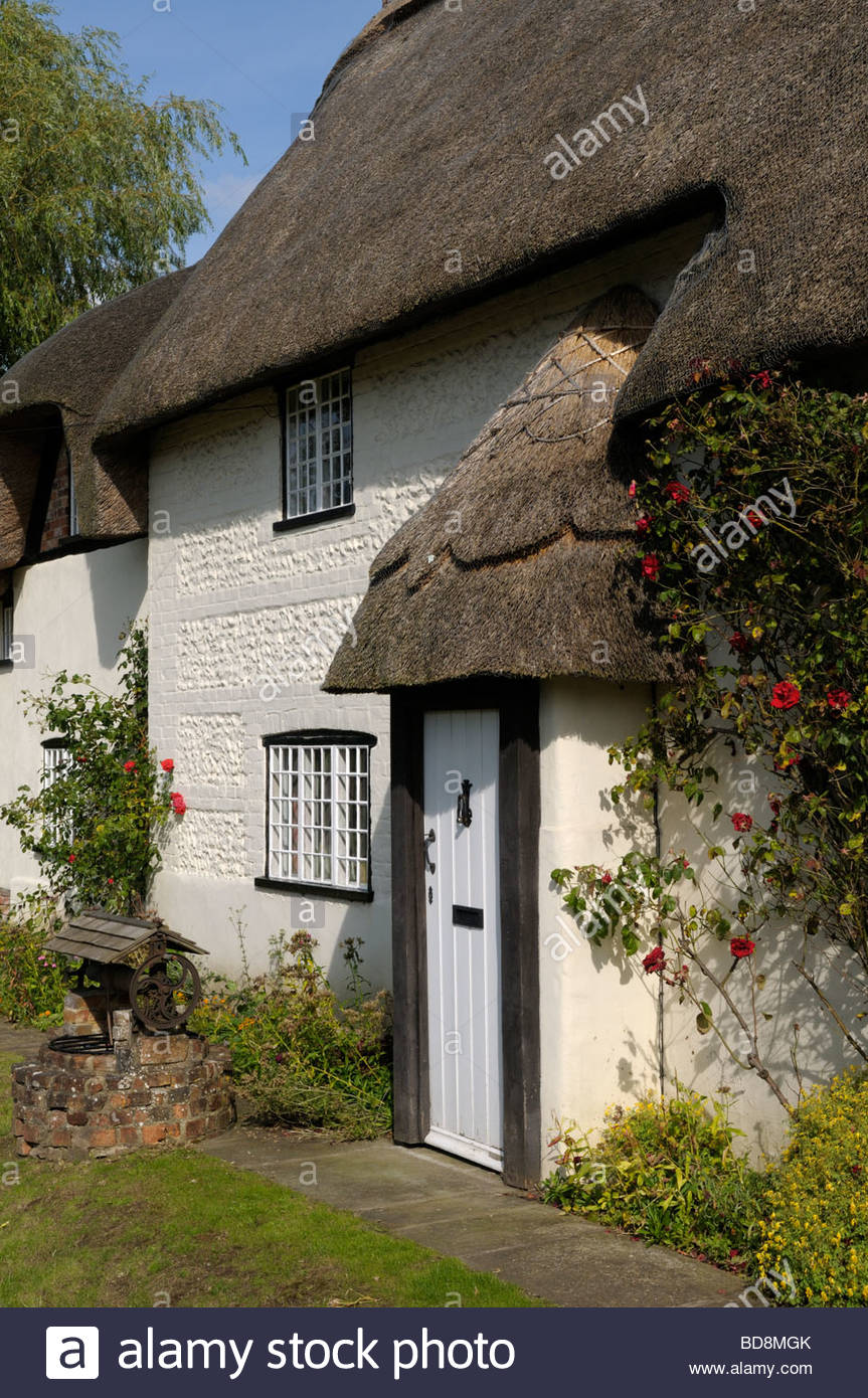 Picturesque Image Of A Thatched Cottage In Tarrant Monkton Dorset