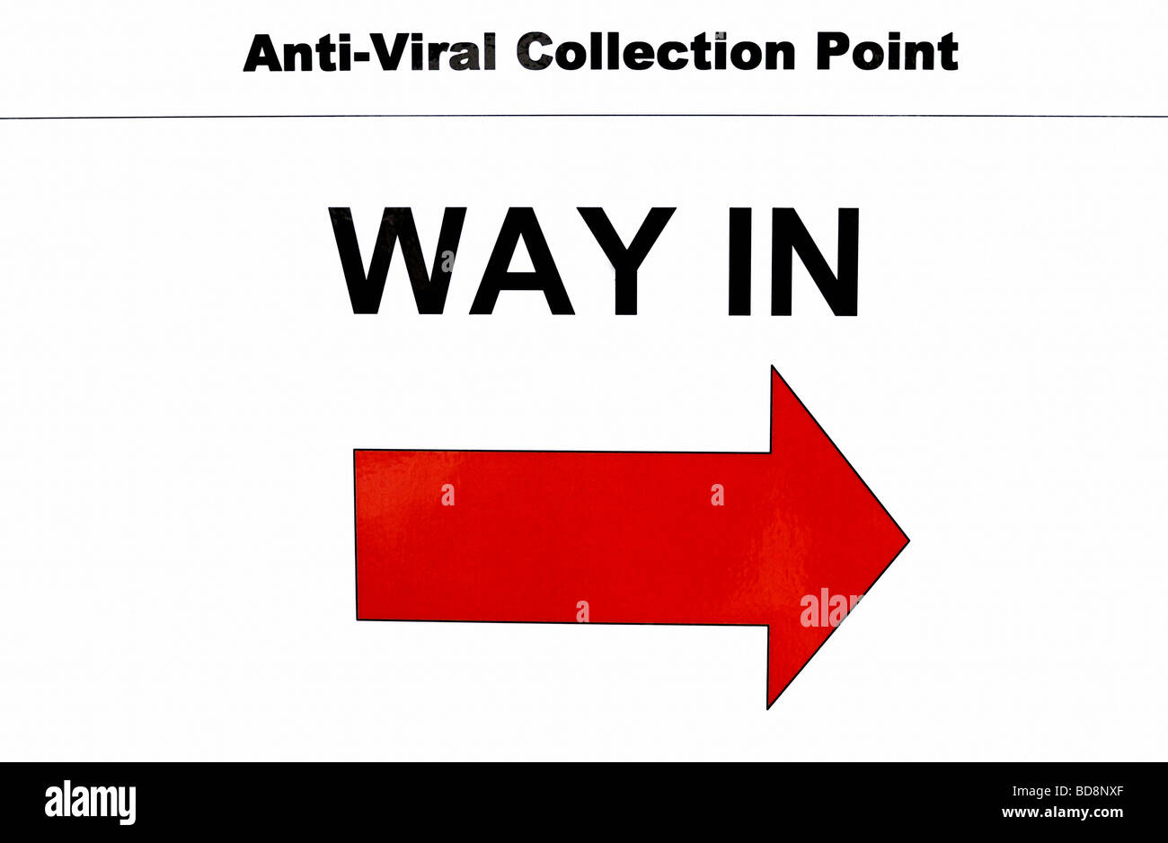 Sign directing people into the Town Hall to collect Tamiflu Anti Viral drugs to combat swine flu Stock Photo