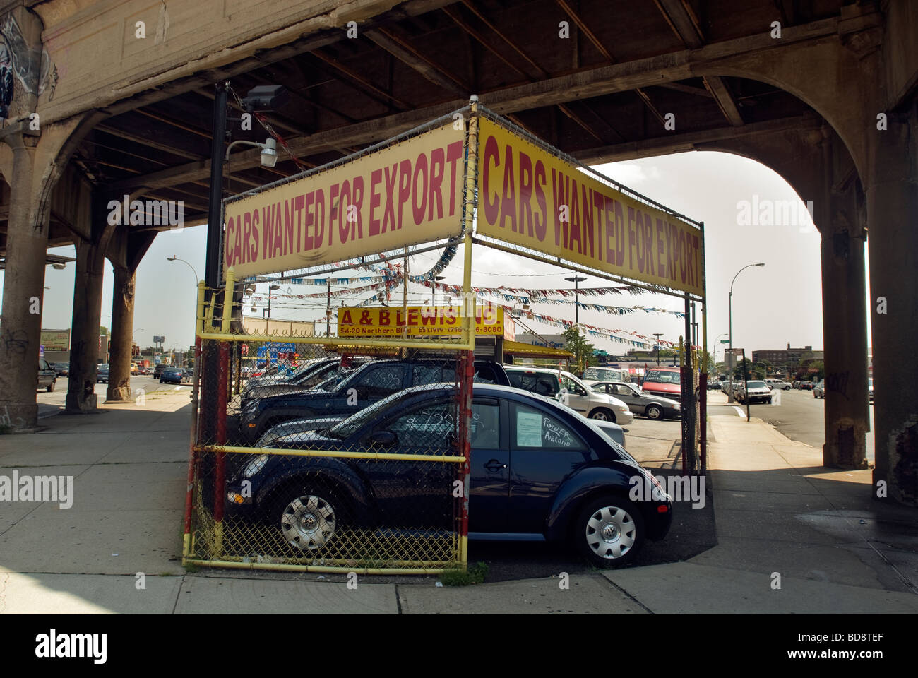 Used and pre owned automobiles are offered for sale at car dealers on Northern Boulevard in the borough of Queens in New York Stock Photo