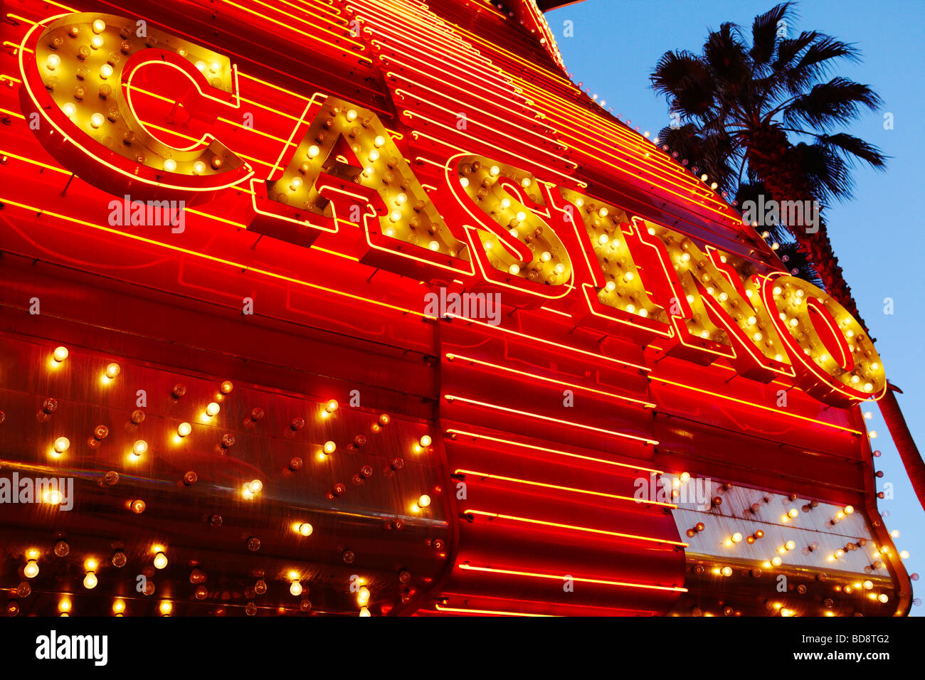 retro neon casino sign, side view Stock Photo - Alamy