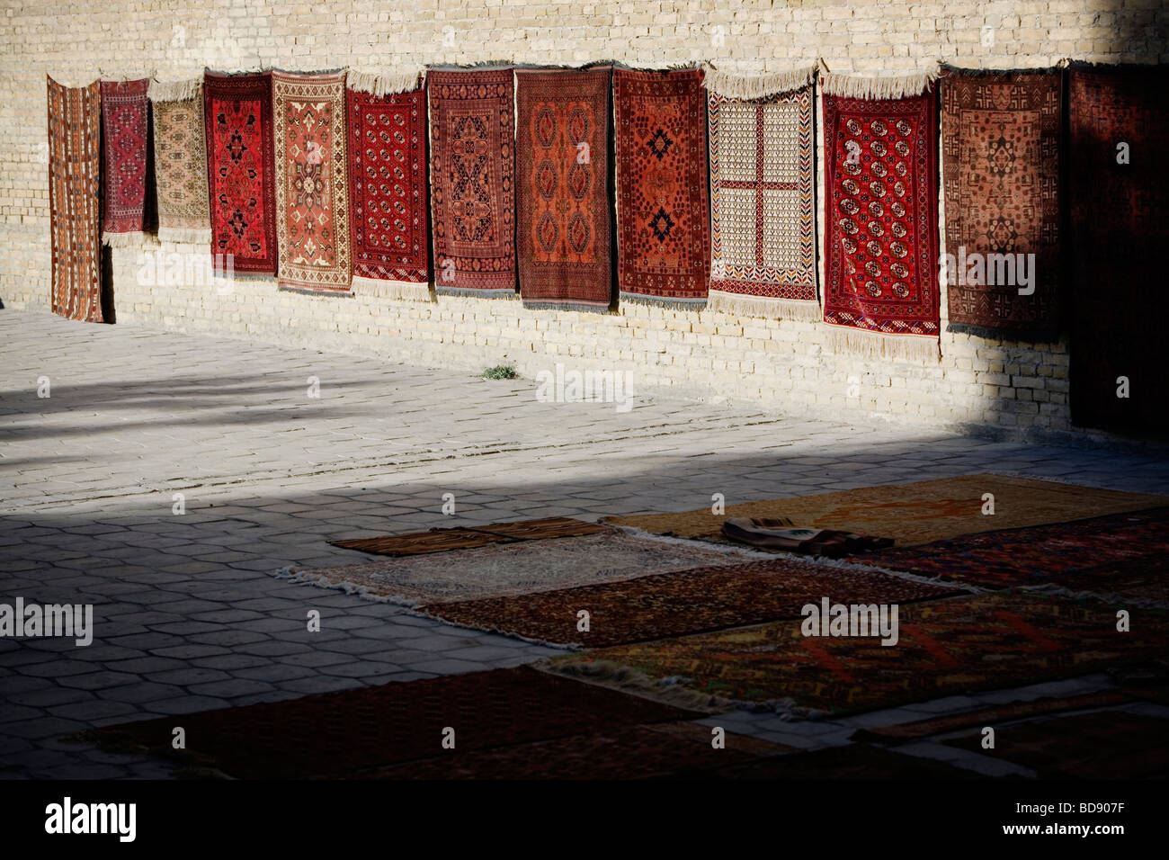 Handmade Uzbek rugs (carpets) for sale in Bukhara, Uzbekistan. Stock Photo