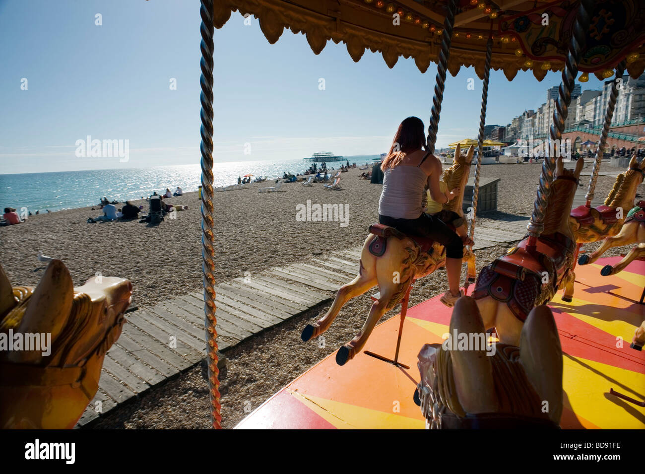 Brighton Britain England Holiday Staycation happy enjoy Summer Sunshine Hot beach Blue sky August carousel Stock Photo