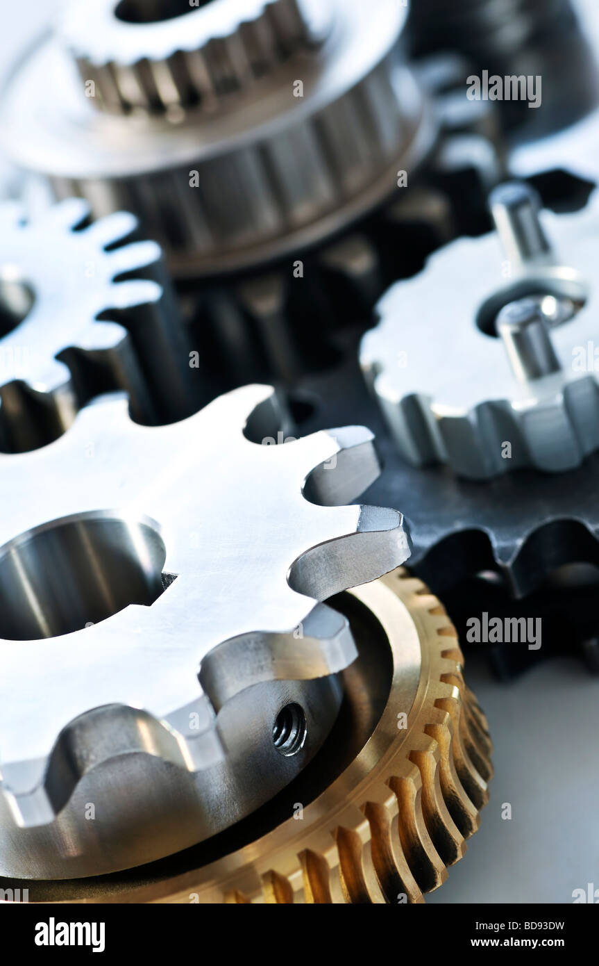 Industrial metal gears and machine parts connected Stock Photo