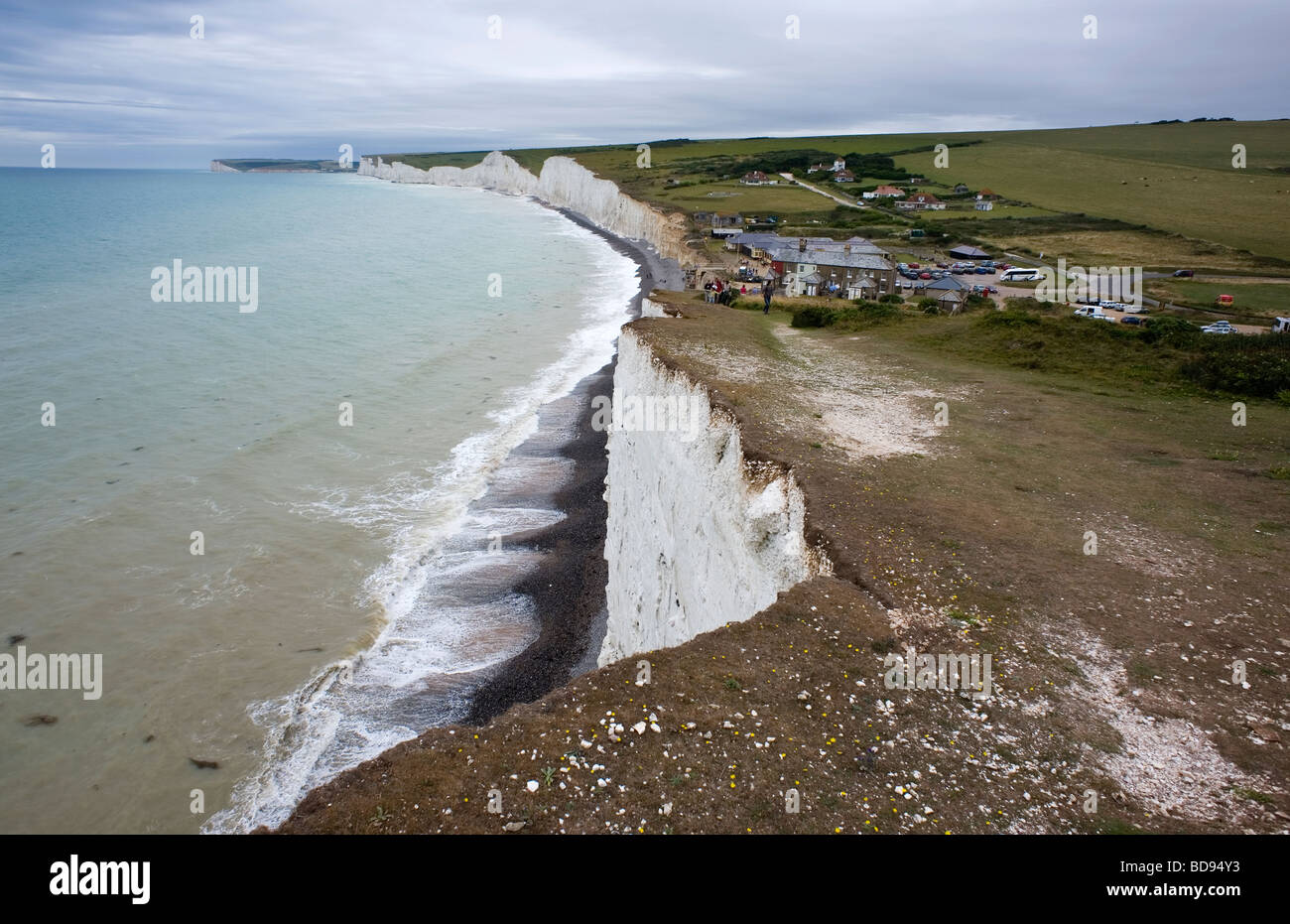 Birling Gap East Sussex Britain Cliff edge at Birling Gap looking towards the Seven Sisters Cliffs Coastal Erosion Stock Photo