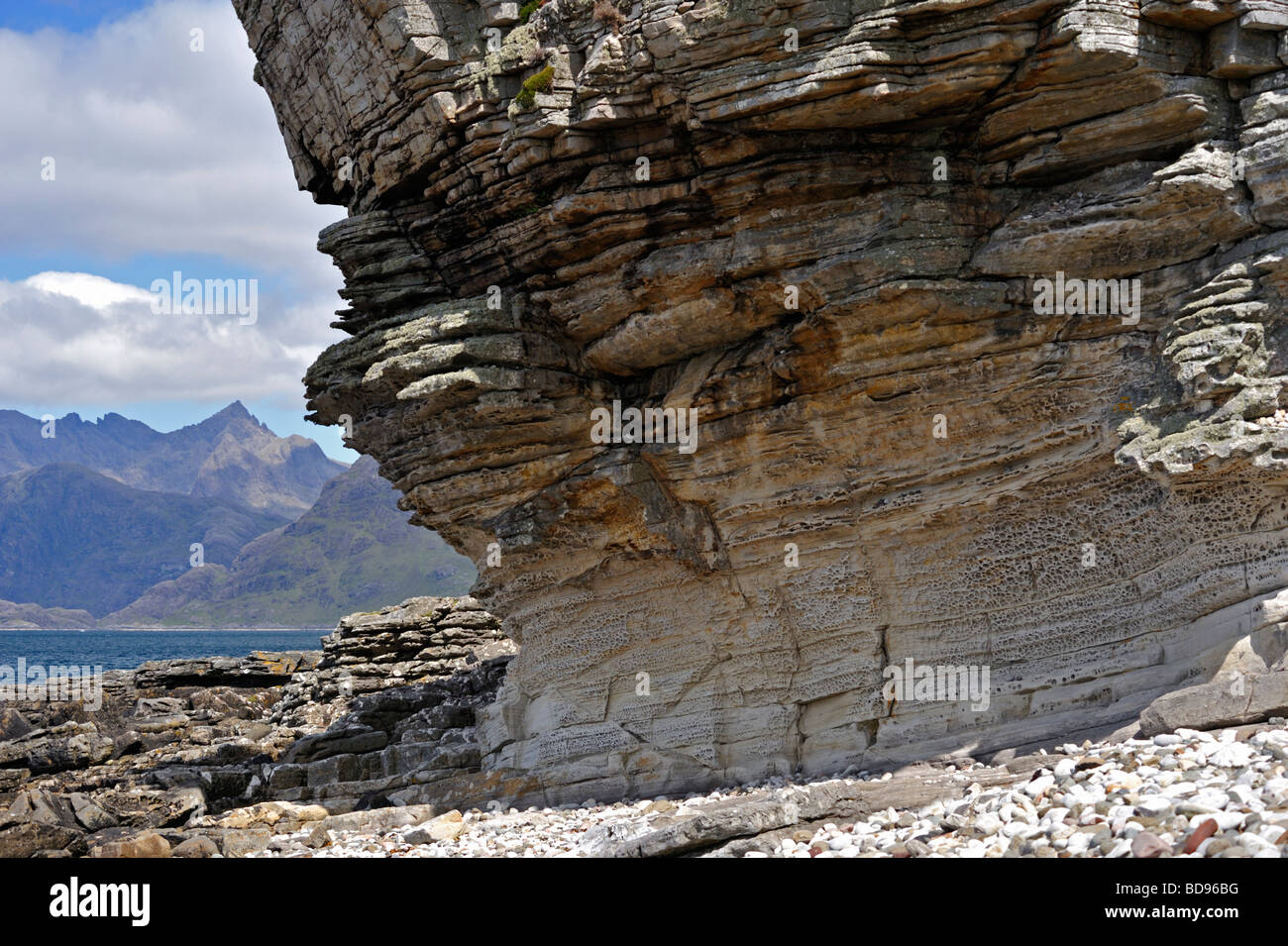 Eroded, overhanging, undercut rock cliff. Elgol, Strathaird, Isle of Skye, Inner Hebrides, Scotland, United Kingdom, Europe. Stock Photo
