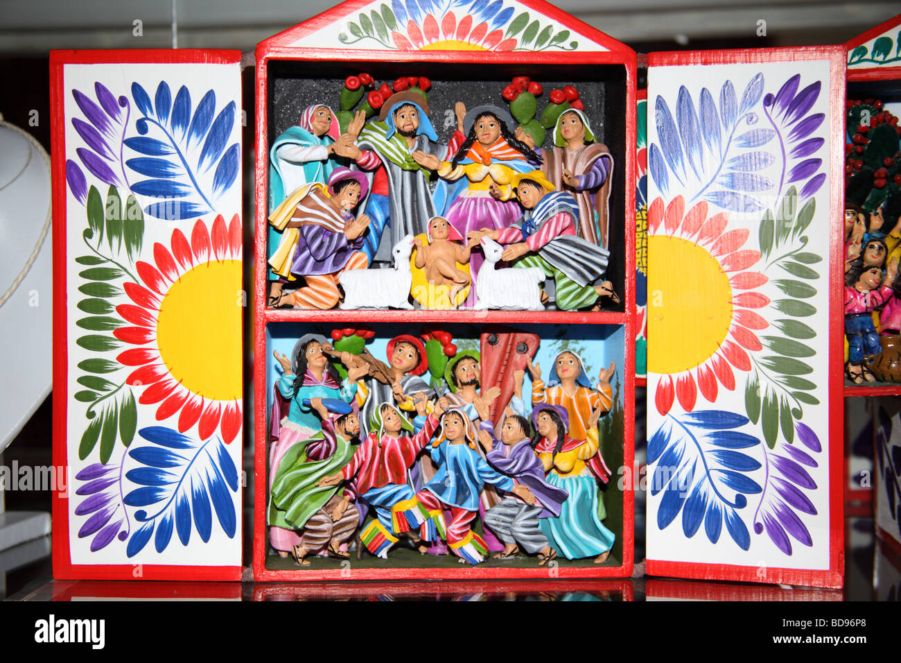 Miniature painted wooden nativity scene on sale in tourist handicraft market, La Paz, Bolivia Stock Photo