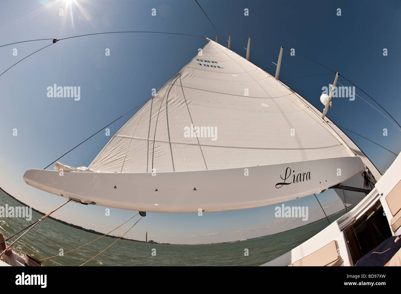 Fisheye view of main sail on sailing yacht Liara underway in Southampton Water Stock Photo