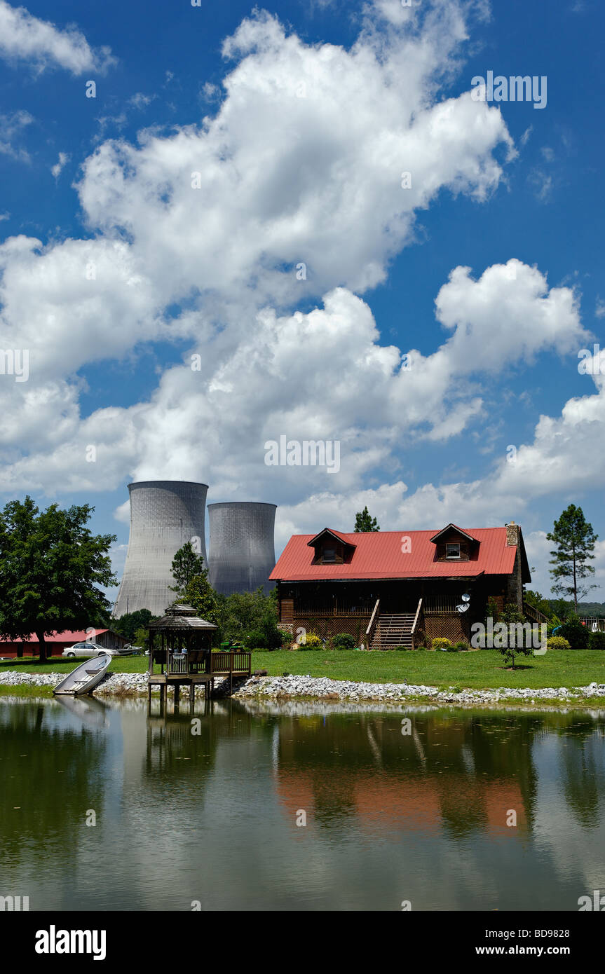 Cabin Reflected in Lake with Watts Bar Nuclear Power Plant Cooling Towers Behind in Meigs and