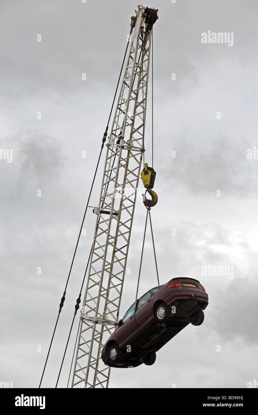 Car on a hoist at a scrap yard, Middlesbrough, UK Stock Photo Alamy