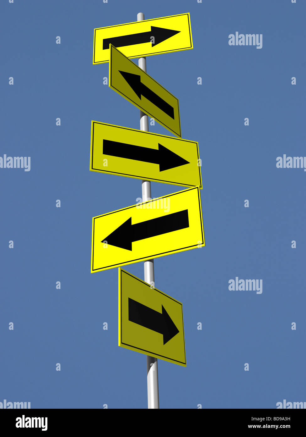 Five directional arrow signs on pole Stock Photo