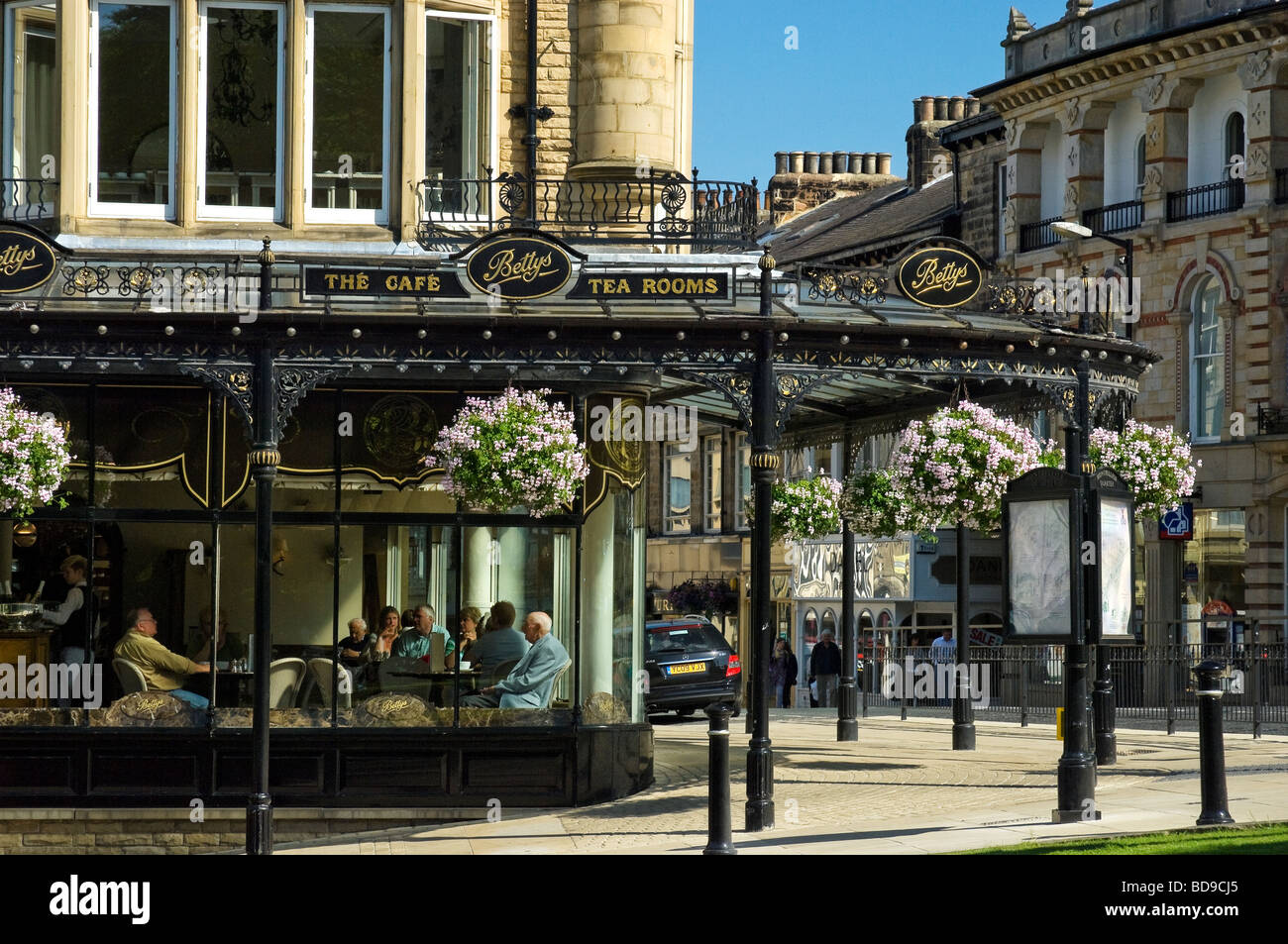 Bettys tea rooms cafe shop in summer on corner of Parliament Street and Montpellier Parade Harrogate North Yorkshire England UK United Kingdom GB Stock Photo