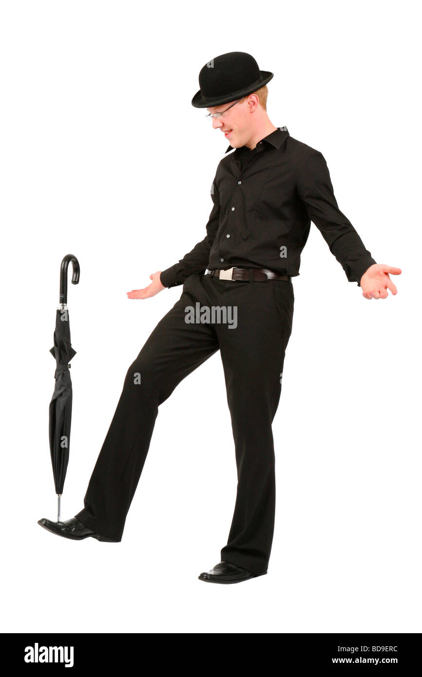 Bowler hat man umbrella hi-res stock photography and images - Alamy